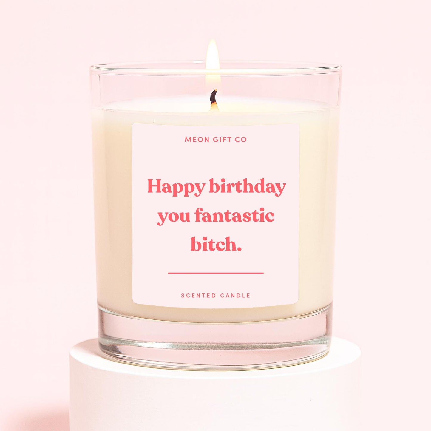 Glass scented birthday candle with label reading "Happy birthday you fantastic bitch."